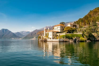 Indulging in Lake Como's Natural Beauty on a Midsummer Visit - white concrete building near body of