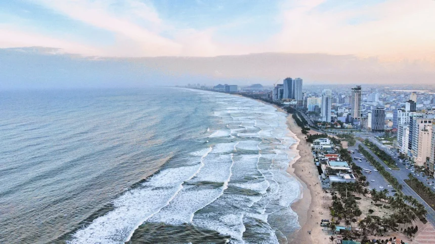 Top 10 Cool Beach Cities - an aerial view of a beach