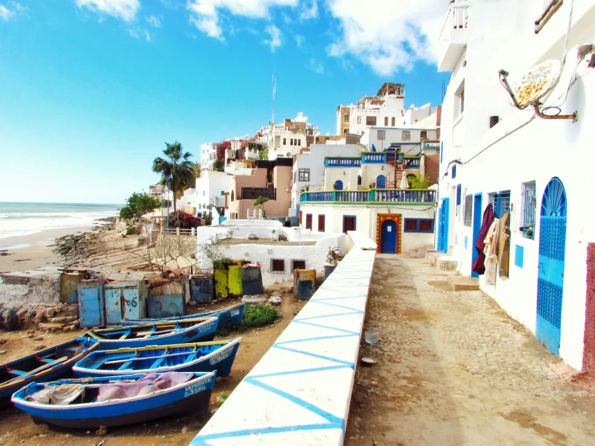 Morocco first visit places - boatd docked near houses and body