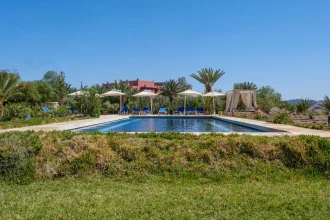 Luxury hotels Morocco - Serene poolside scene in Ouarzazate Lake