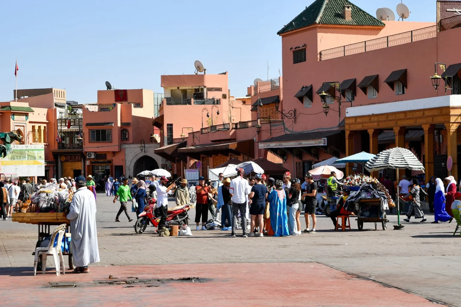 Marrakech medina food - Lively market scene in Marrakesh with