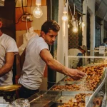 Morocco street food - A vendor in a bustling market